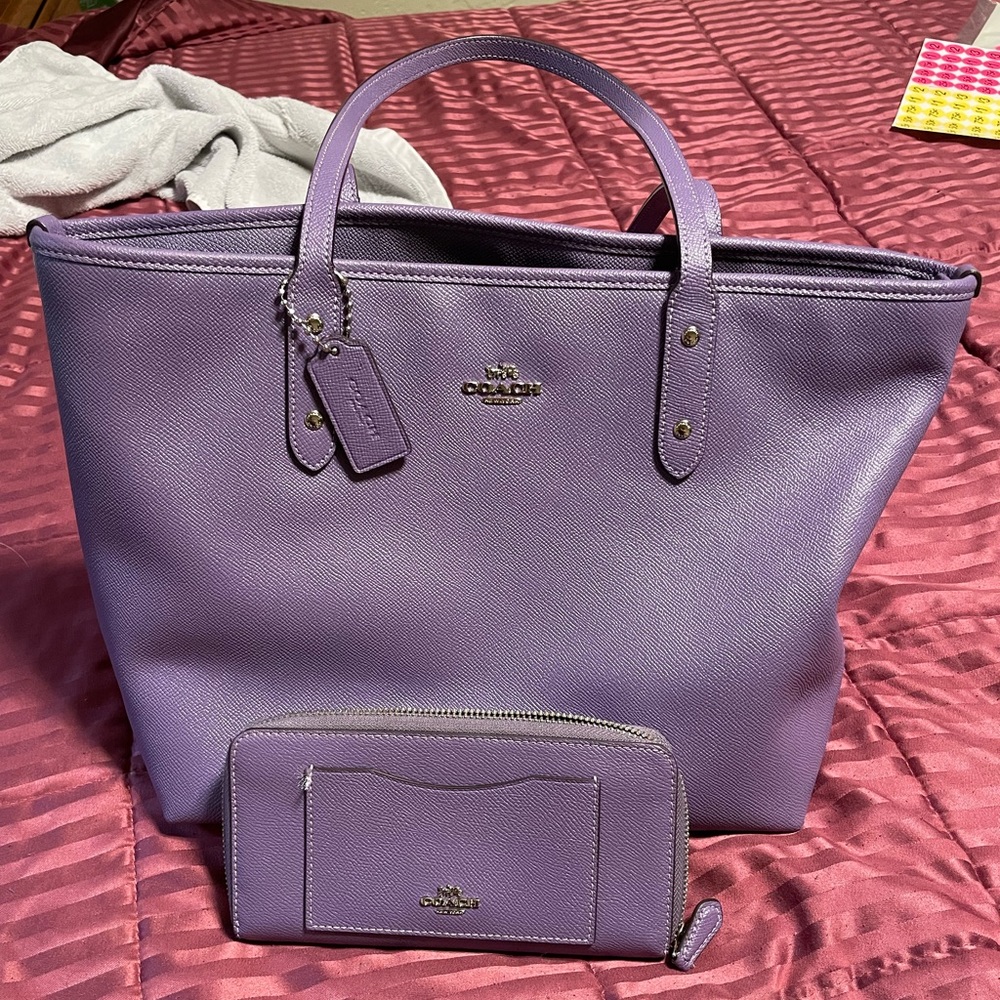 Purple Coach purse with matching wallet